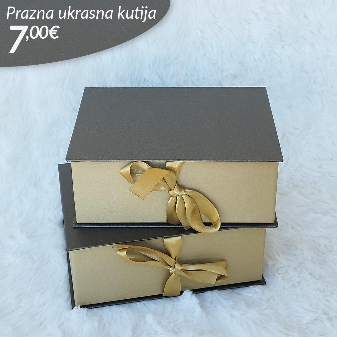 Zlatna ukrasna kutija sa mašnicom